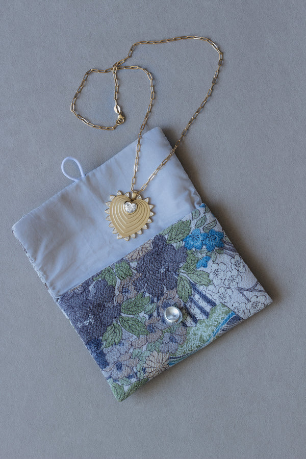 Expanding Heart Trillion Necklace
