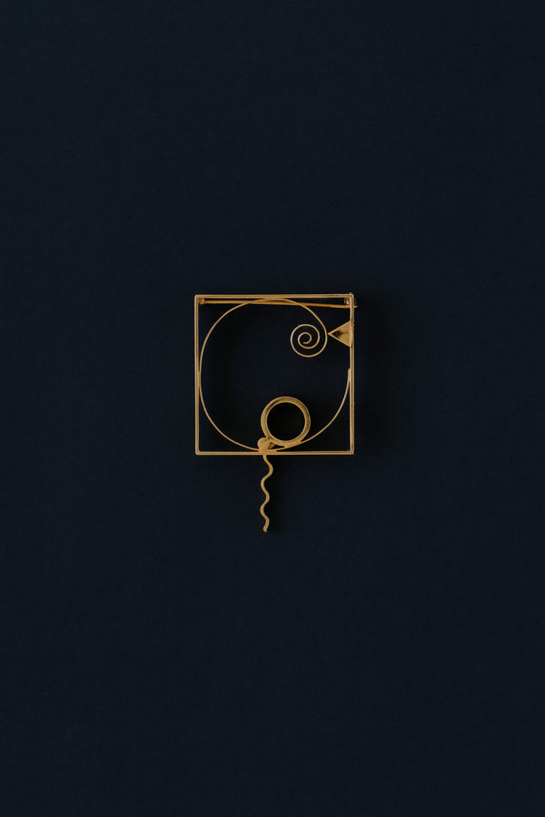 Fletcher Benton gold vermeil square frame brooch with twisted ribbon, 1986, front view