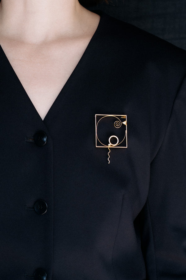 Fletcher Benton pin on blazer model
