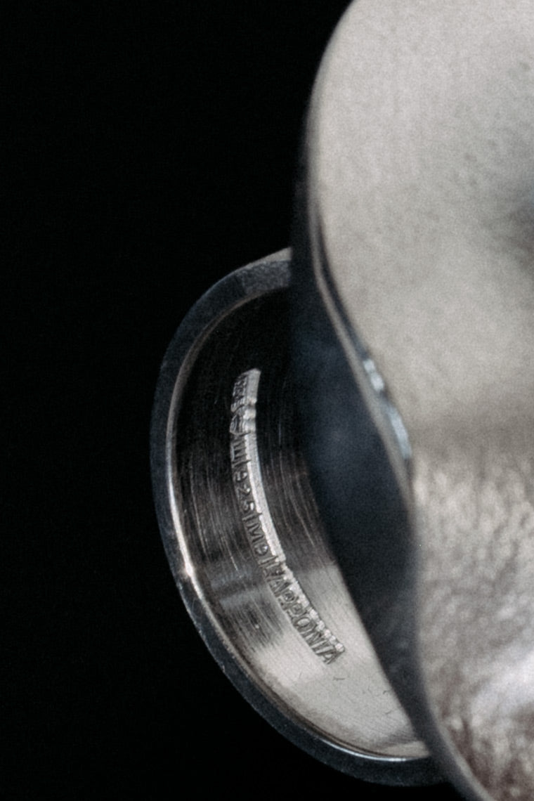 Close-up of Lapponia and Björn Weckström hallmark stamp on sterling silver ring band