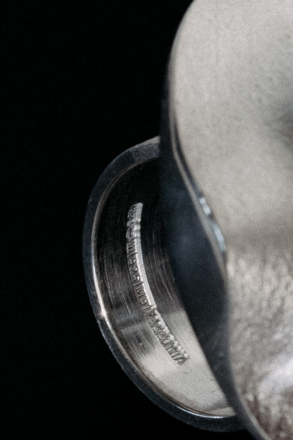 Close-up of Lapponia and Björn Weckström hallmark stamp on sterling silver ring band