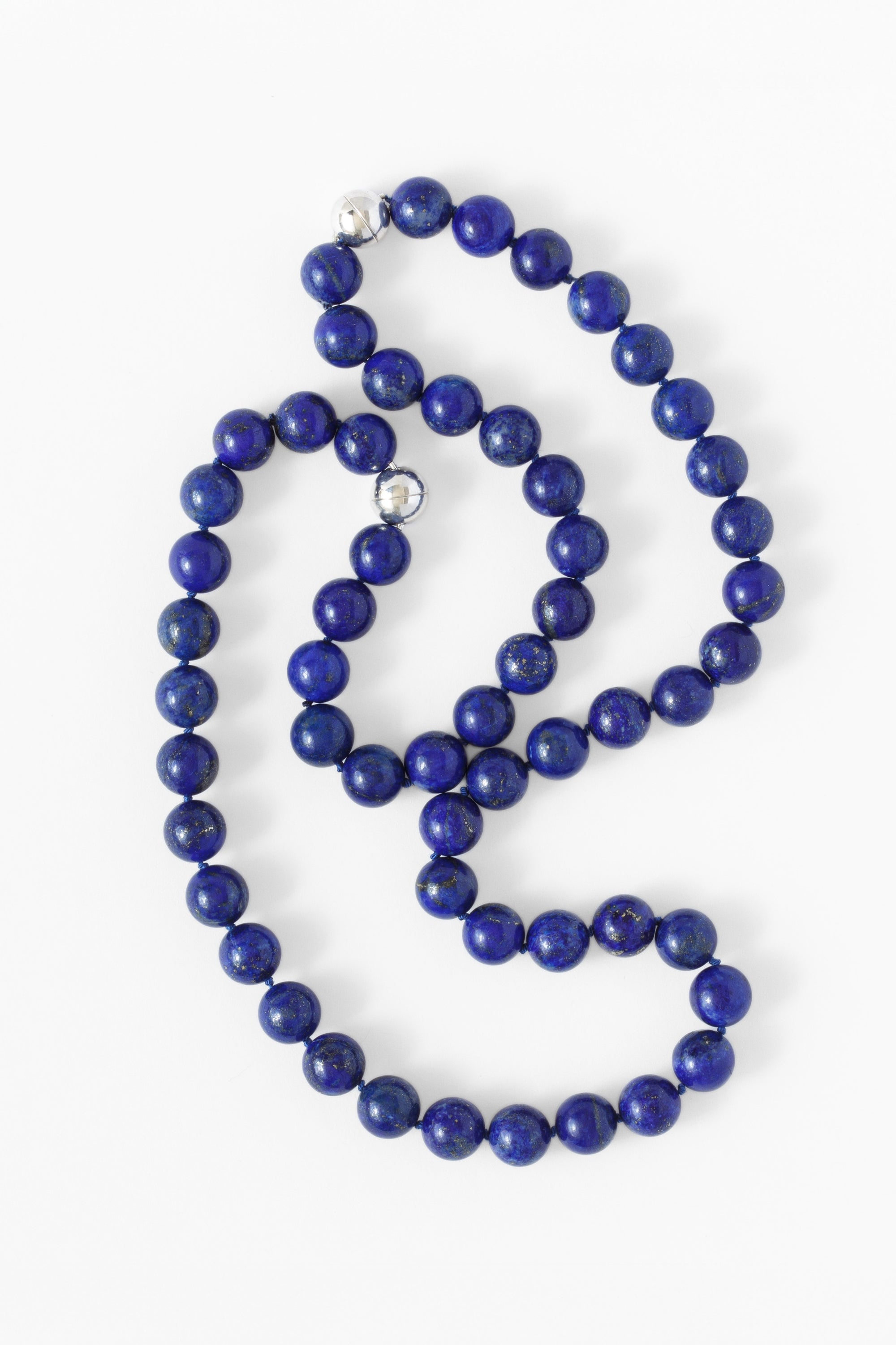 Lapis lazuli necklace on a white background