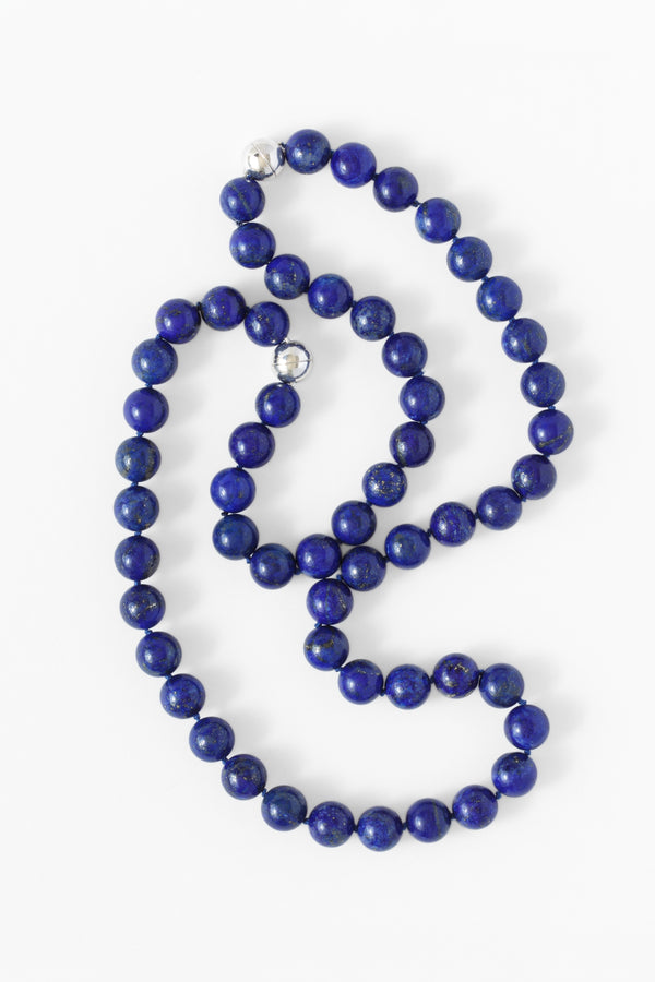 Lapis lazuli necklace on a white background