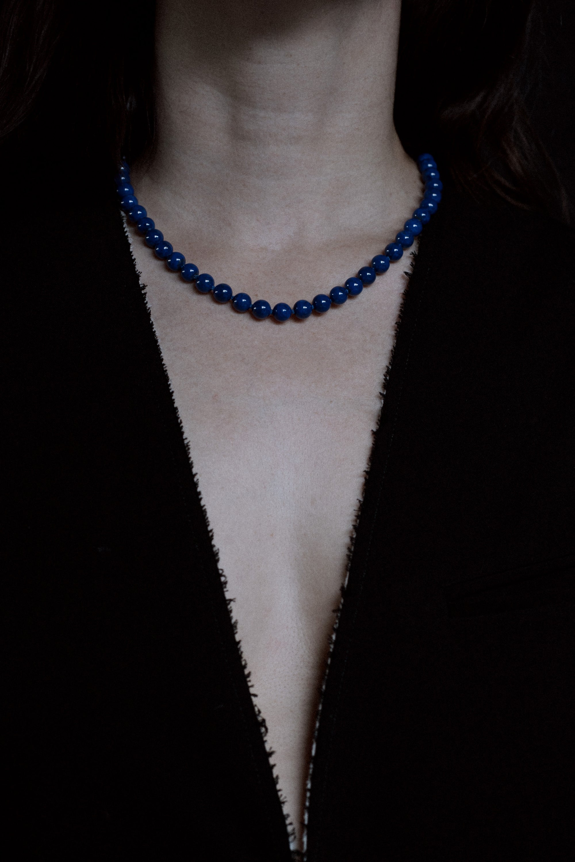 Ouvelle Modern Matriarch Lapis Blue Beaded Slim Necklace on model with black blazer