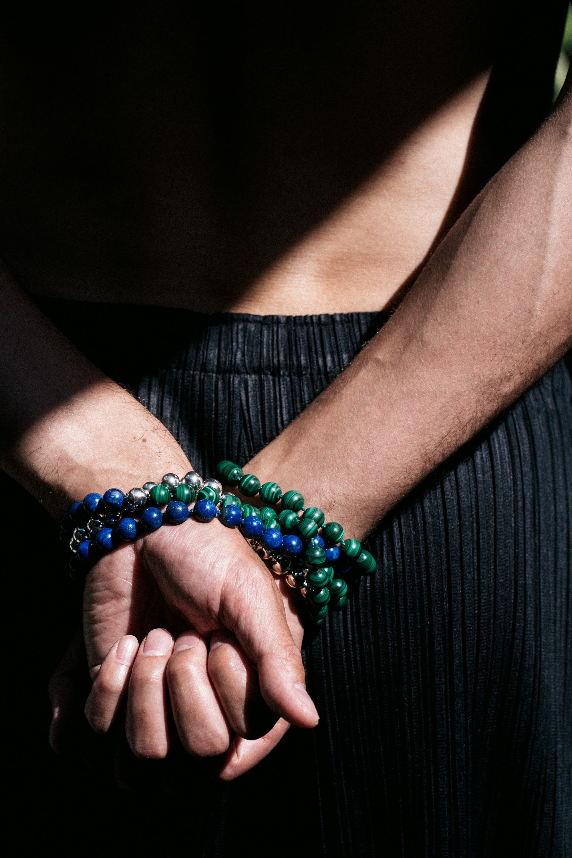 Modern Matriarch Beaded Necklace Set tied around a mans wrist bondage