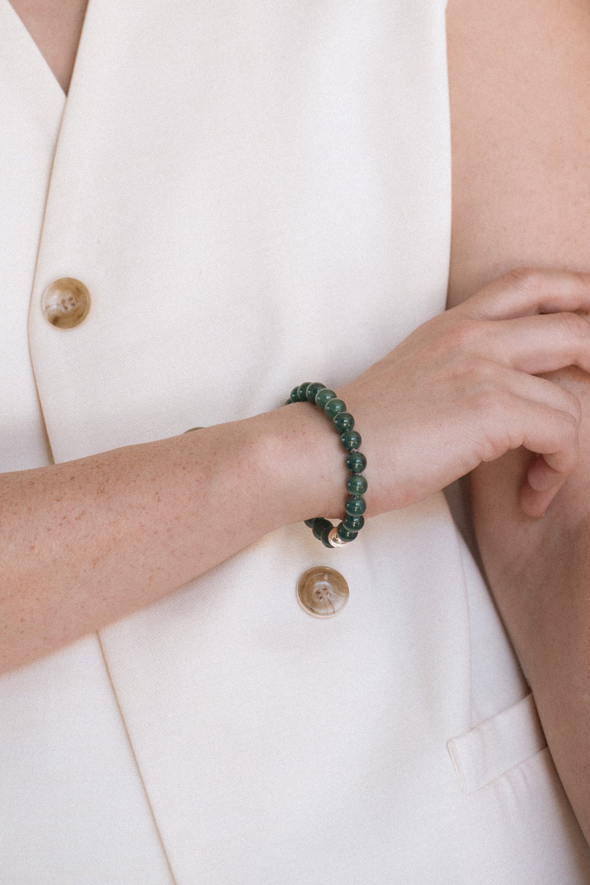 Guatemalan Jade Beaded Bracelet on Model Ouvelle Jewelry