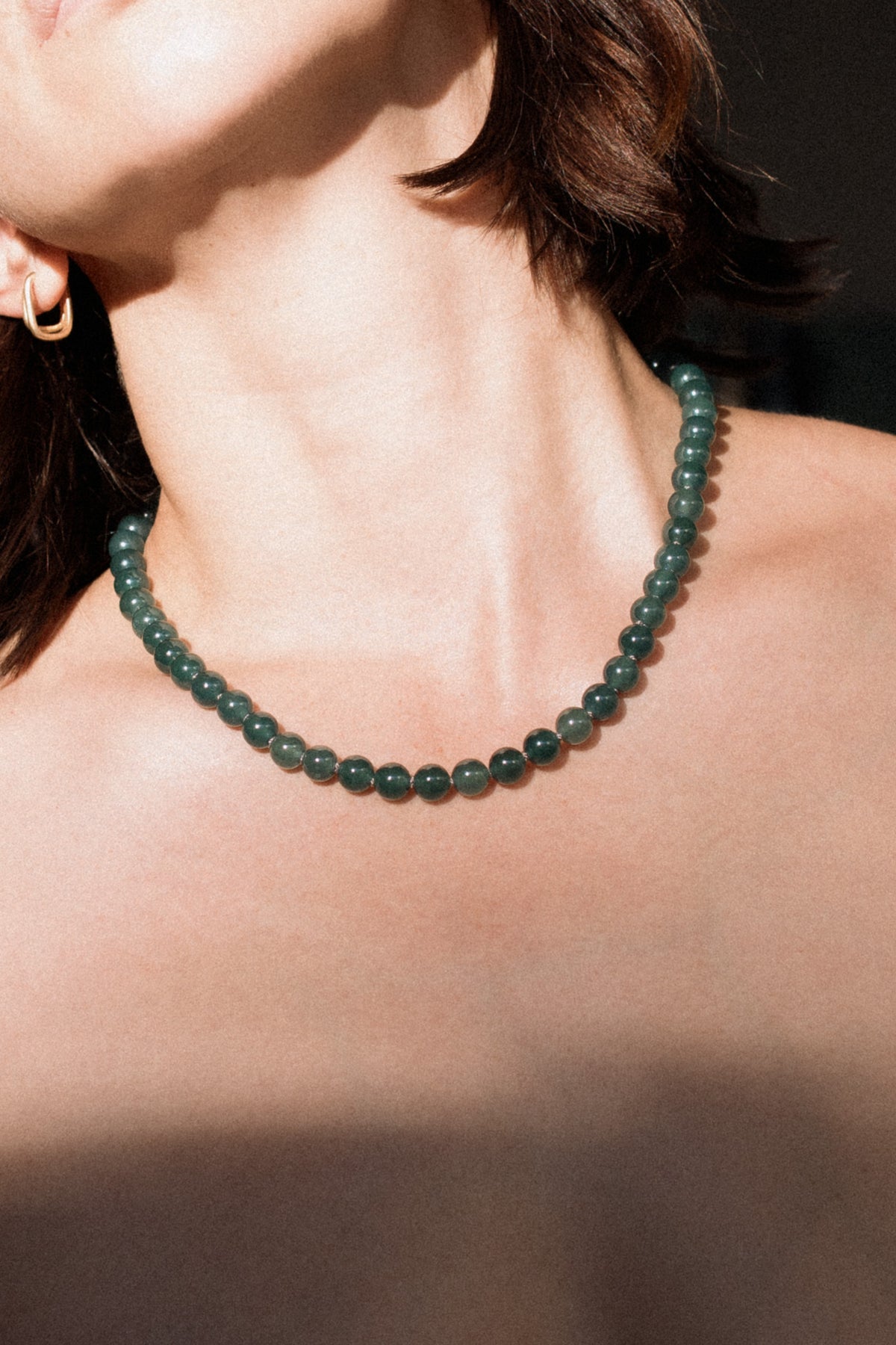 Guatemalan Jade Beaded Necklace on model in sunshine Ouvelle Jewelry