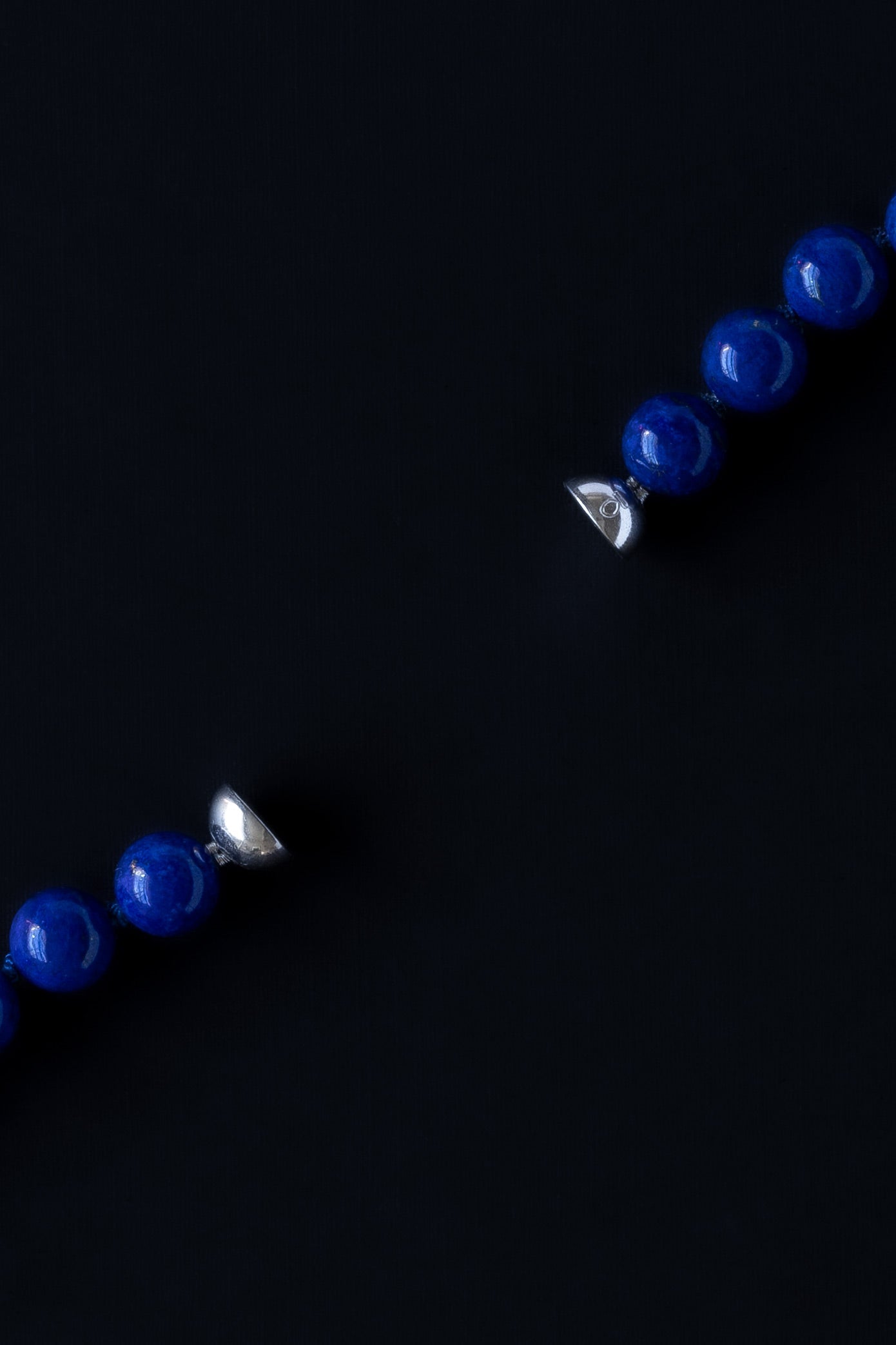 Ouvelle Modern Matriarch Lapis Blue Beaded bracelet magnet close up