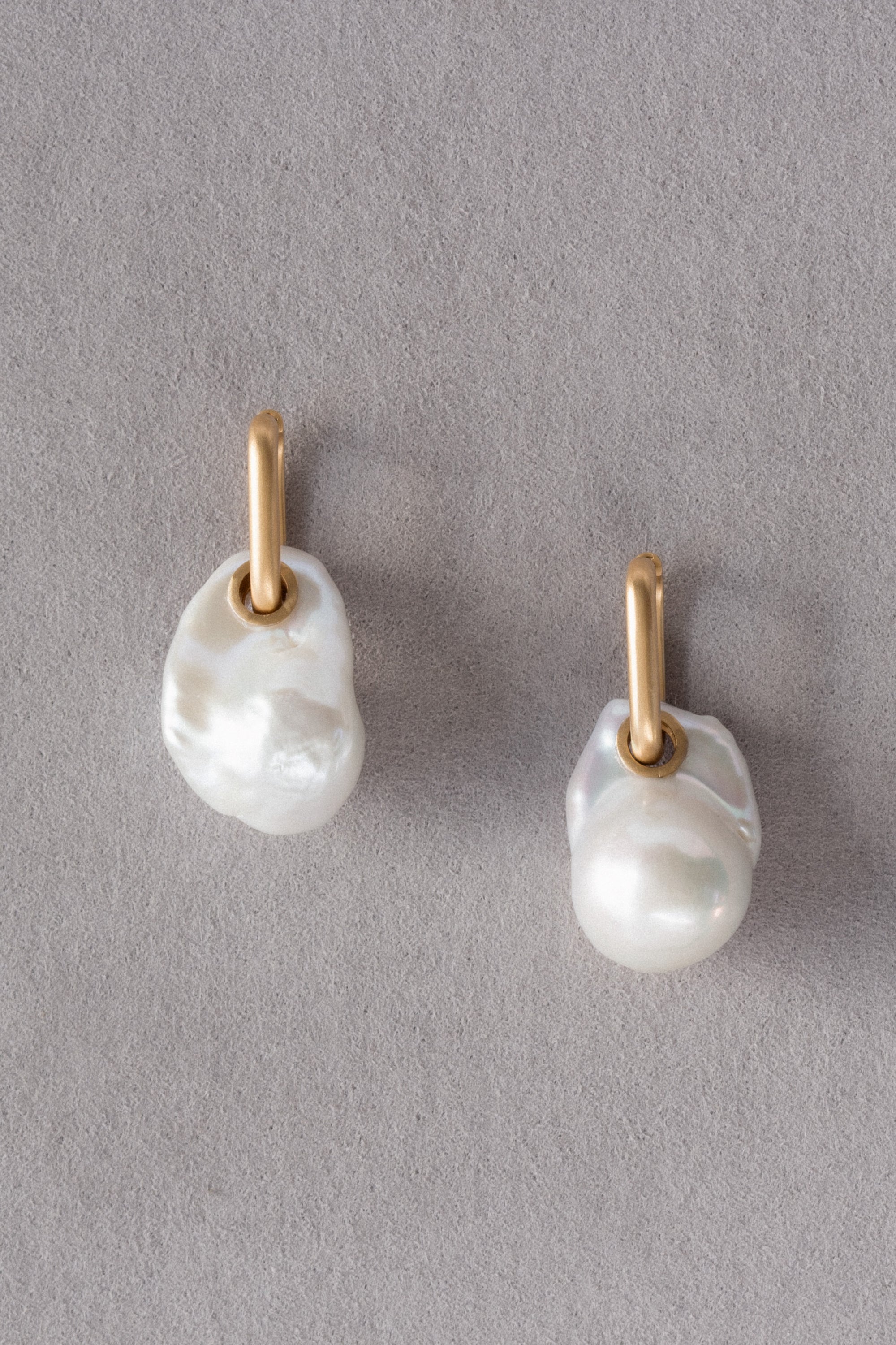 Mother Of Pearl Baroque Pearl 18k Gold Earrings On Grey Background