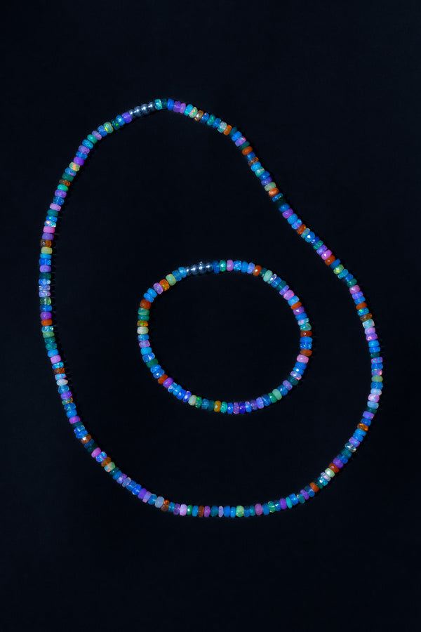 Ouvelle Bead Baby Beaded Opal Rainbow Necklace & Bracelet Set on black background
