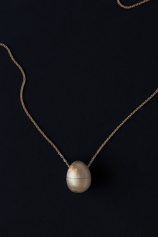 Ouvelle Egg shaped locket vessel necklace in 18k yellow gold 