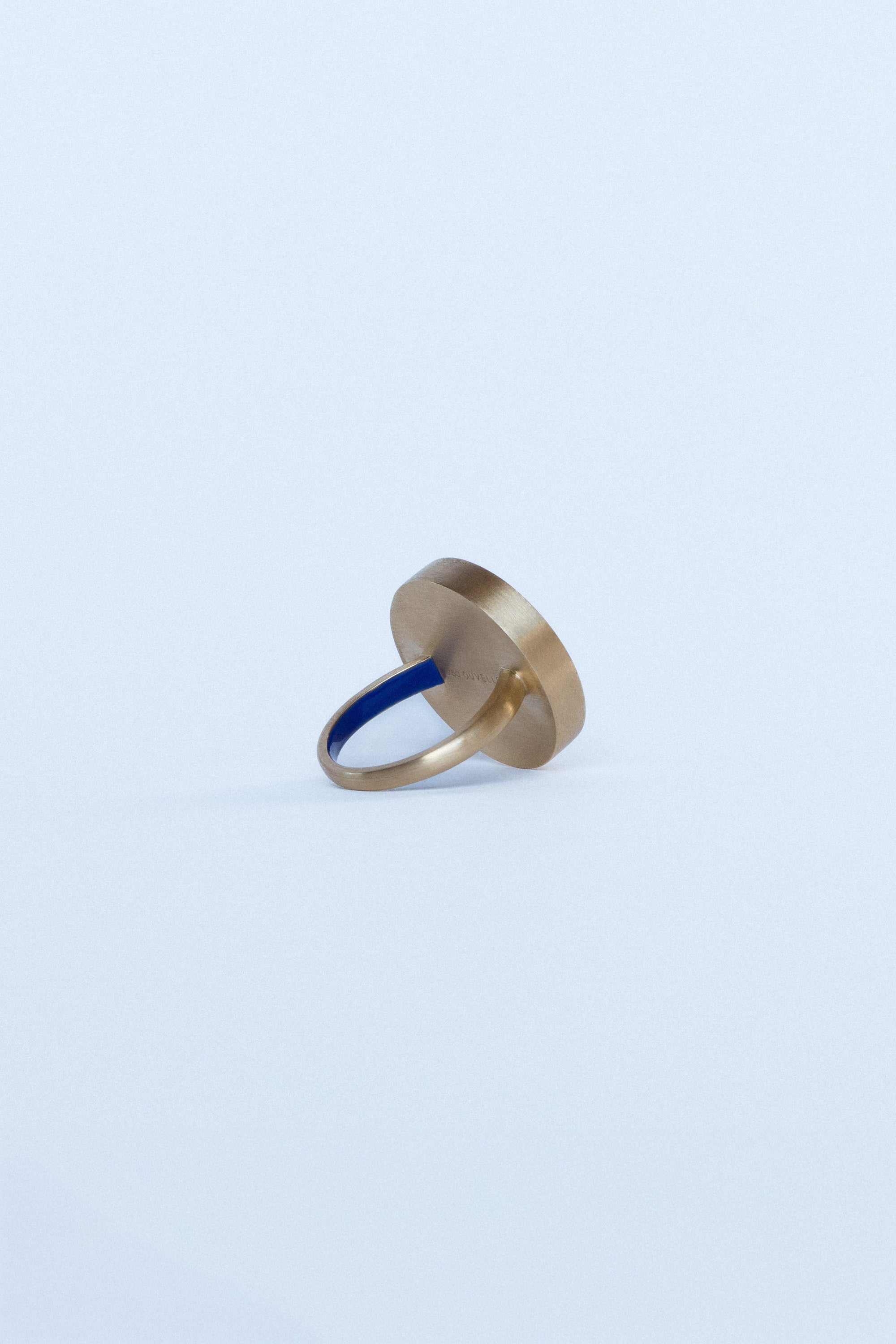 Seed ring representing moment of conception 18k yellow gold and pear shaped diamond set in Lapis inlay by Ouvelle side view