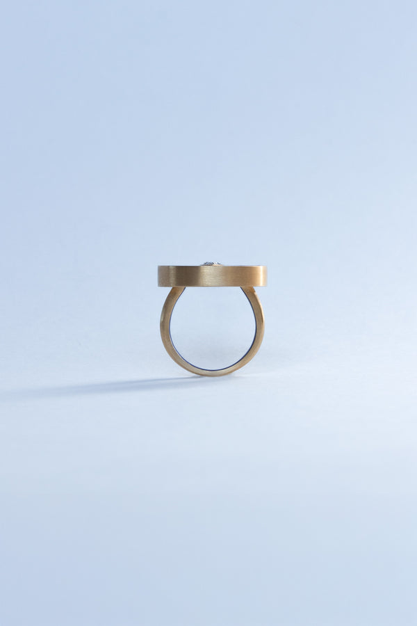 Seed ring representing moment of conception 18k yellow gold and pear shaped diamond set in Lapis inlay by Ouvelle side view Side View